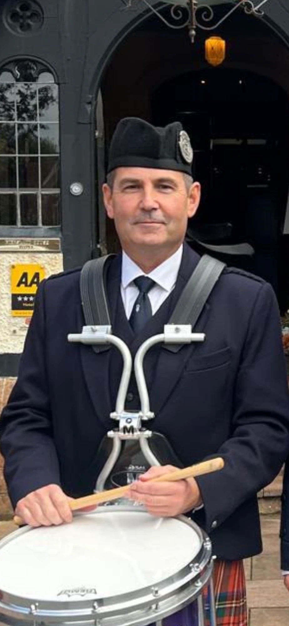 Stevie Burns, Leading Drummer, in band uniform with snare drum